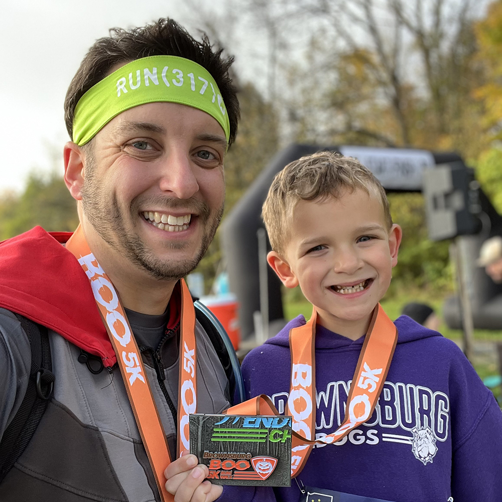 Dad and son after a 5K race