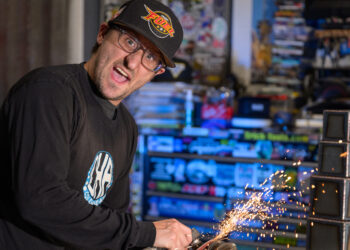 Trophy maker in his workshop