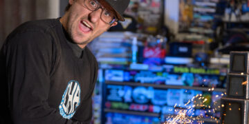 Trophy maker in his workshop