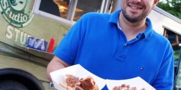 Vendor in front of a food truck