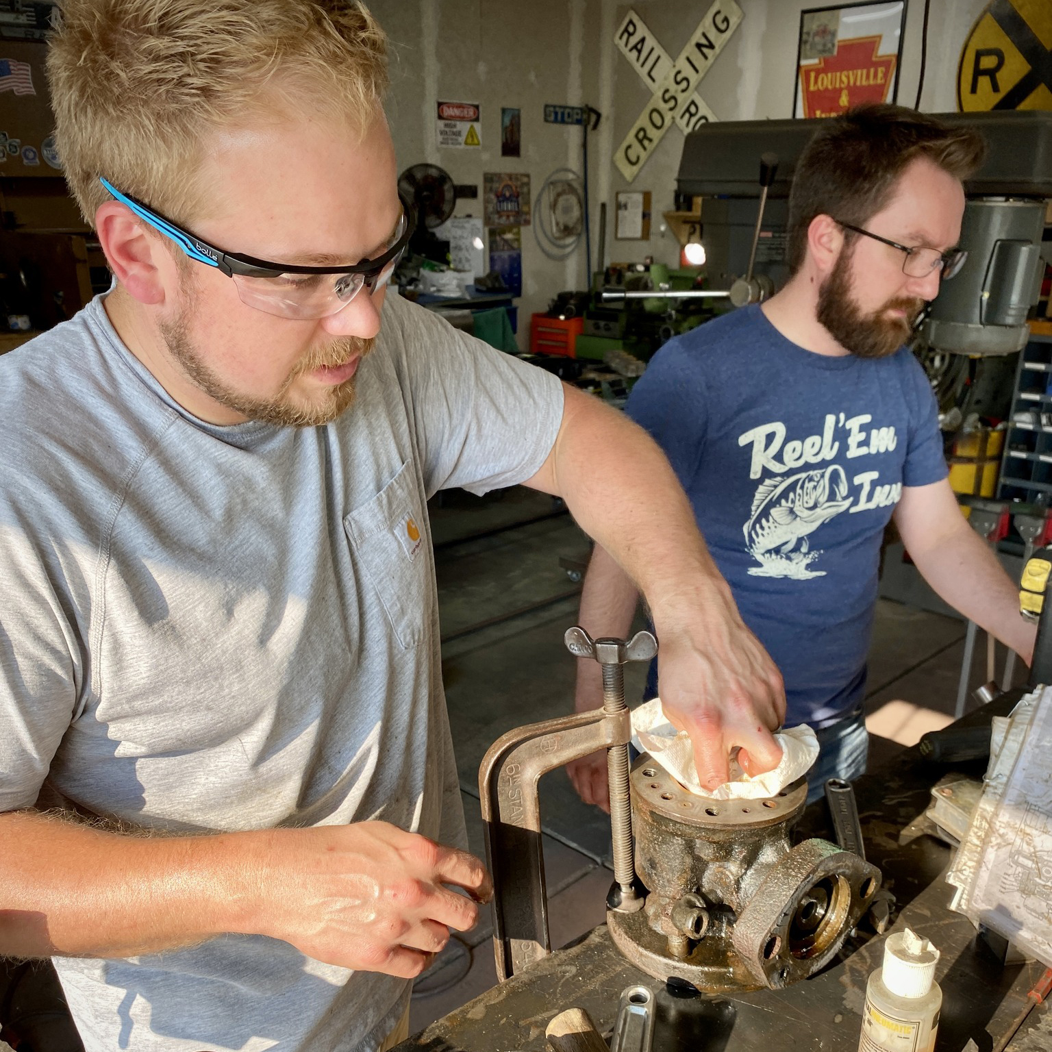 Men working on trolley car restoration