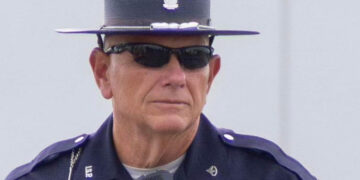 Police officer wearing cool sunglasses
