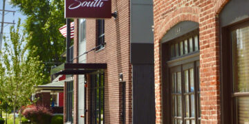 Condo sign on the side of a building