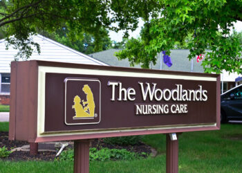 Nursing home sign made out of wood