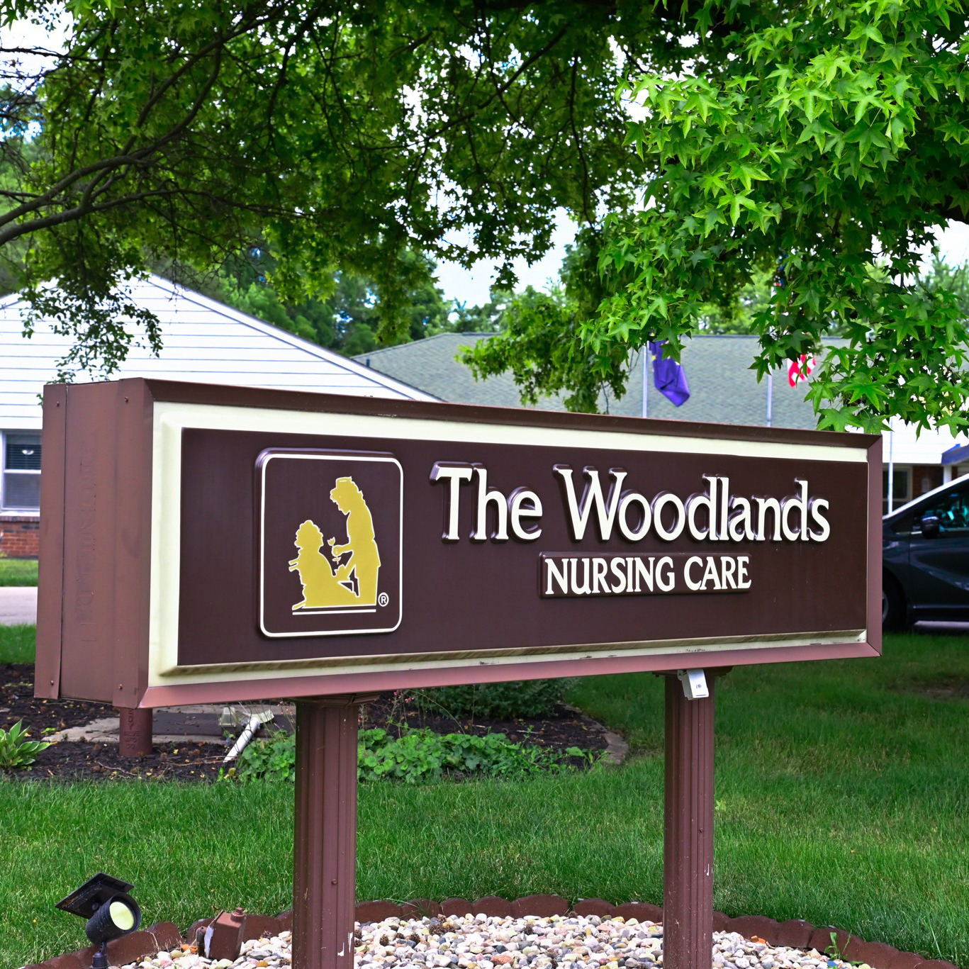 Nursing home sign made out of wood