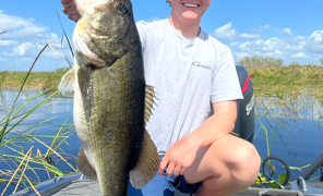 Man holding out fish