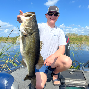 Man holding out fish