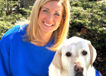 Woman with her lab mix dog