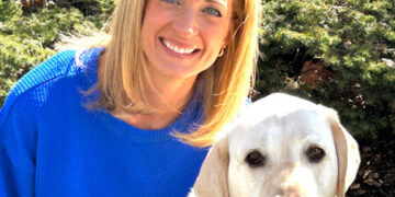Woman with her lab mix dog