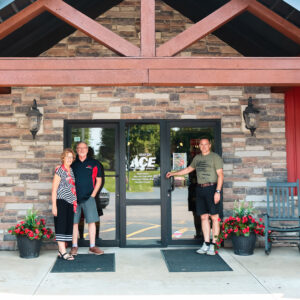 Family in front of a hardware store