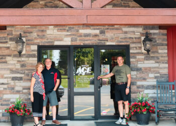 Family in front of a hardware store
