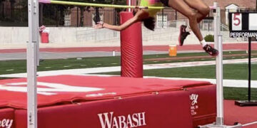 Woman doing the high jump