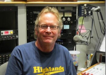 John Timmons in the DJ booth at the radio station