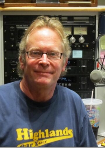 John Timmons in the DJ booth at the radio station