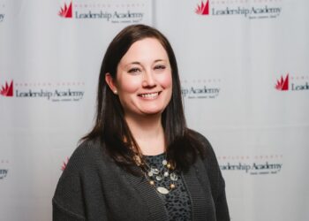 A woman's headshot at an event