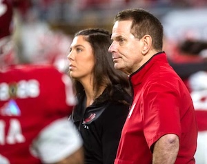 Lauren Cooley, Graduate Student Athletic Trainer, with IU Hoosiers Head Football Coach Curt Cignetti