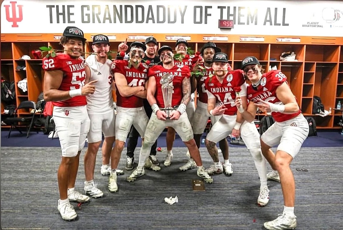 IU Football players celebrating in the locker room after winning the National Championship