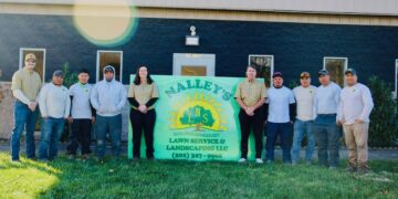 Nalley's Landscaping team in front of their store front