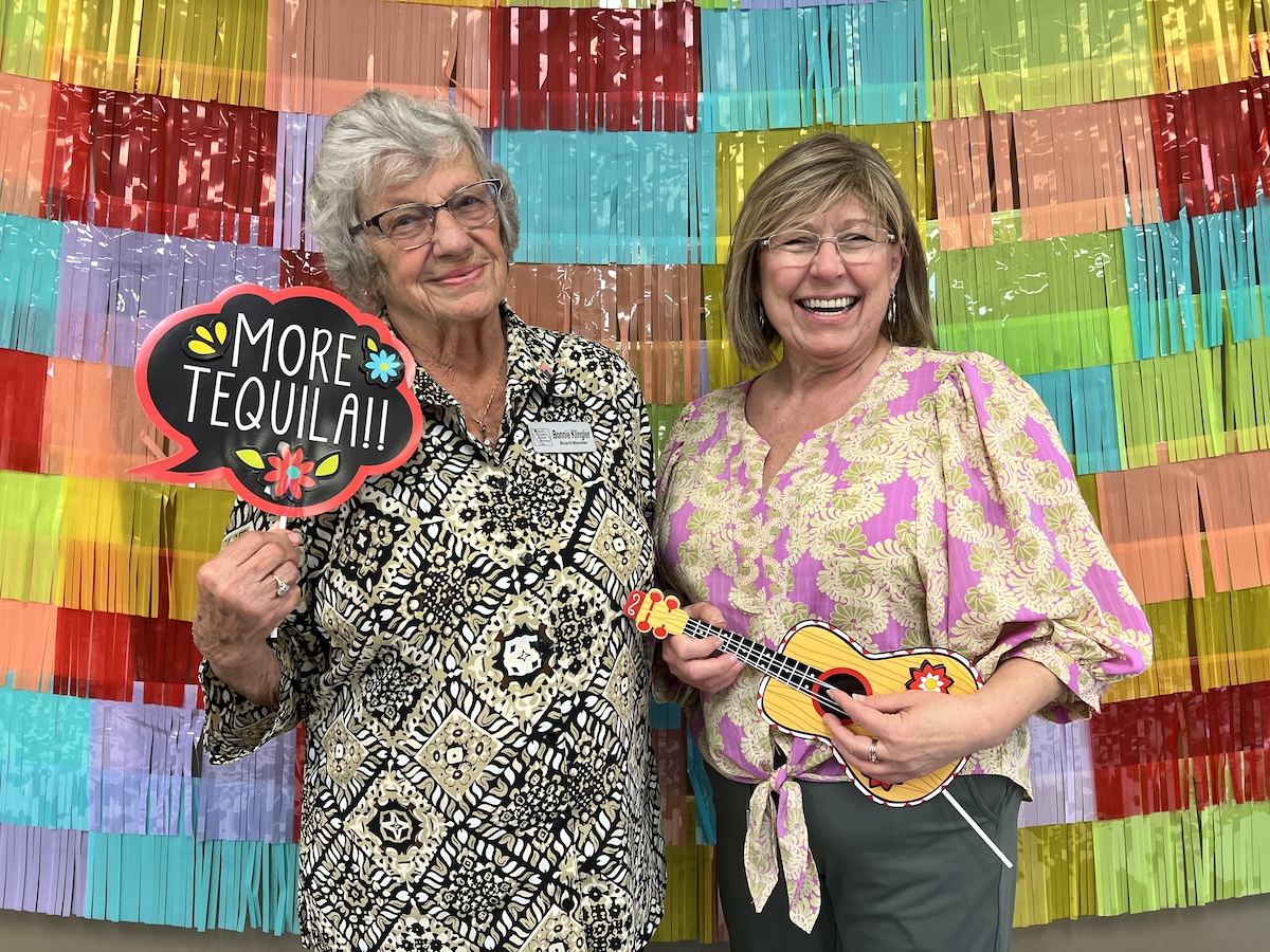 2 women at a volunteer fiesta