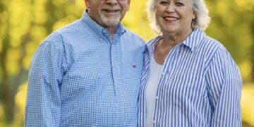 Jack and Sharon McMahon with trees in the background