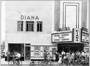 A black-and-white vintage photograph captures the grand opening day of the historic Diana Theatre. The sleek Art Deco or Art Moderne style facade features the word "DIANA" written in stylized lettering above three upper-story windows. A crowd of community members, including children and adults with parked bicycles, stands on the sidewalk underneath the lighted marquee. The marquee reads "GRAND OPENING TODAY COMEDY CARNIVAL," and vertical signs reading "DIANA" flank the entrance canopy.