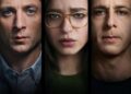A movie-style poster titled "THE SOCIAL RECKONING" in a modern blue-accented font at the bottom. The background is completely black, and the image features a dramatic close-up split-screen of three intense faces looking directly forward. On the left is Jeremy Allen White with striking blue eyes, in the center is a woman wearing glasses with clear/amber frames and a green sweater, and on the right is Jeremy Strong with a serious expression.