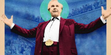 An official alternative illustrated poster for the movie "Digger", featuring an artistic, collage-style depiction of Tom Cruise as the billionaire oil tycoon Digger Rockwell. Dressed in a western-style dark red blazer, white collared shirt, bolo tie, and a large gold belt buckle, he stands with his arms spread wide in a theatrical gesture. His head is framed by a glowing turquoise circle reminiscent of a halo. The background is a textured, deep blue overlaid with faded images of a massive audience seated in a grand auditorium or government assembly.
