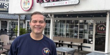 Chris Collins in front of the Vintage Spoon at Geist Marina